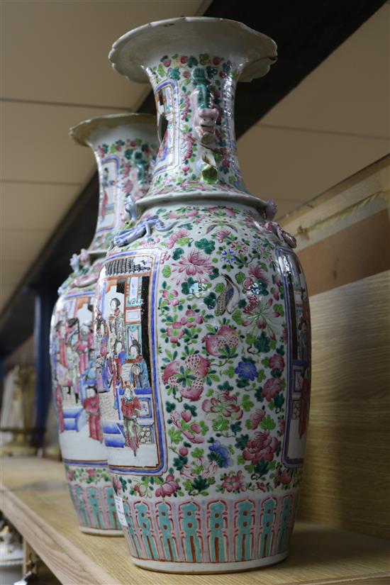 A pair of 19th century Chinese famille rose vases height 61cm (both a.f.)